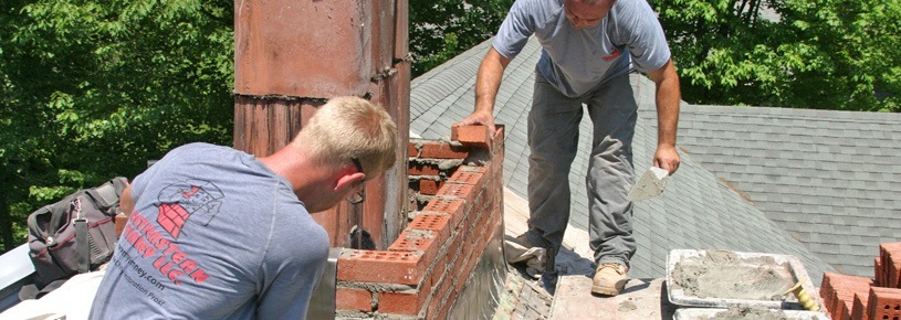 rebuilding the chimney from roof up in bloomfield ct by masonry experts