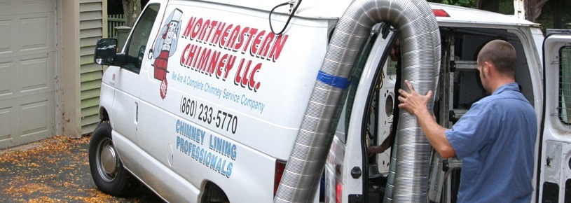 chimney service tech preparing to install chimney liner in farmington ct area