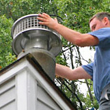 Certified Chimney Sweep installing Chimney Cap in Wallingford ct