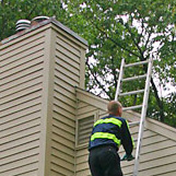 Chimney Technician performs a chimney inspection on a home on Farmington Ave West Hartford CT