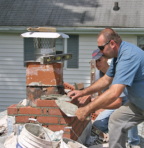 chimney experts repairing chimney in avon ct.