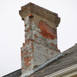 white stained chimney in need of repair in burlington ct