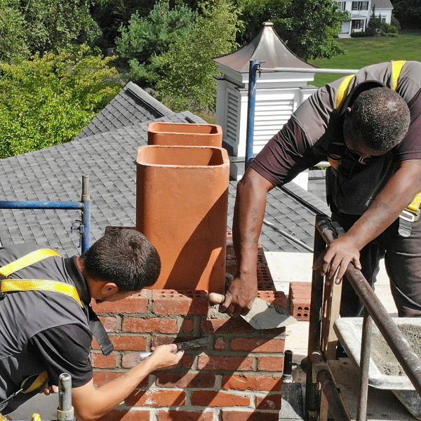 Chimney Crew Rebuilding a Historic Chimney in Bristol CT