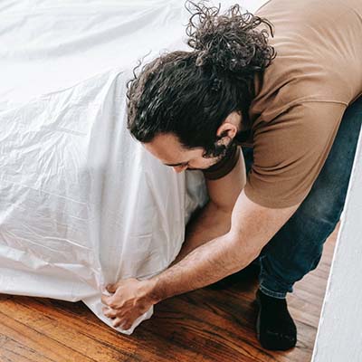 Protecting furniture before fireplace cleaning in Rocky Hill CT