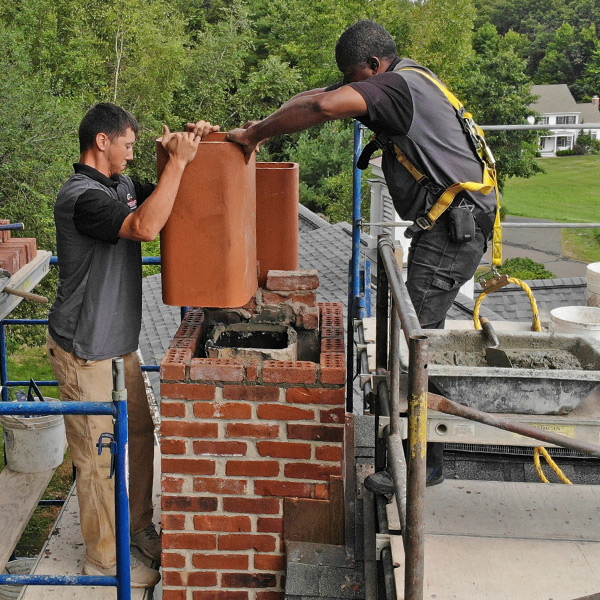 Masonry Chimney Rebuilding and Flue replacement in Granby CT