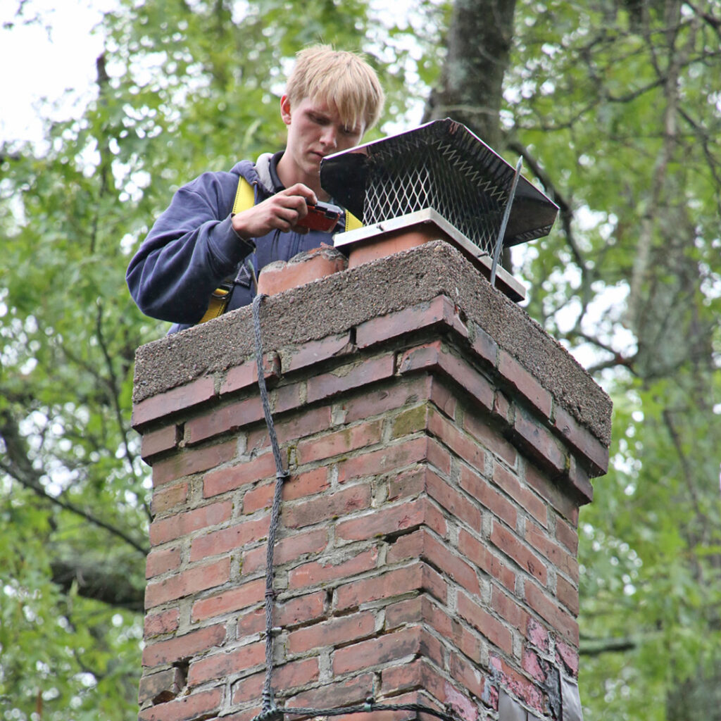 Keep rain out of the flue with a quality chimney cap in Avon, CT