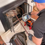 A professional chimney inspection helps determine if a fireplace changeout is needed to address liner damage ventilation issues or outdated components in Avon, CT